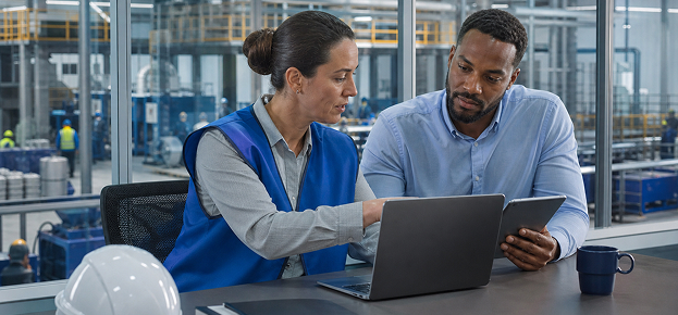 Compliance Management System - 02 EHS consultant organizing a facility's compliance documentation system